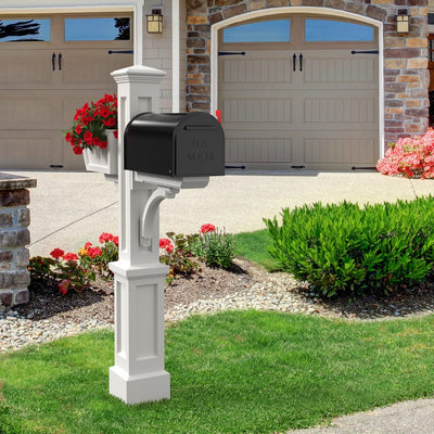 The Mayne Westbrook Plus Mail Post, in the white finish, installed for curb appeal.