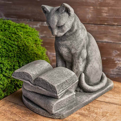 Campania International Hemmingway Statue, set in the garden to add charm and character. The statue is shown in the Greystone Patina.