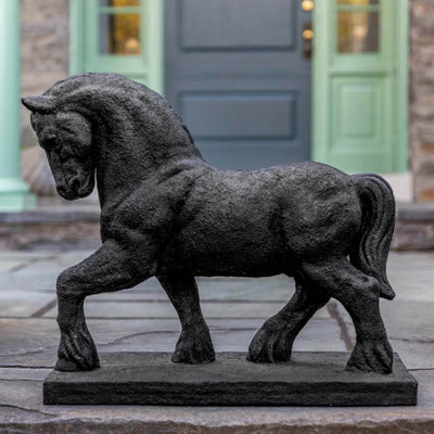 Campania International Roman Horse Statue, set in the garden to add charm and character. The statue is shown in the Nero Nuovo Patina.