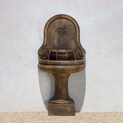 Campania International Valencia Fountain, adding interest to the garden with the sound of water. This fountain is shown in the Pietra Nuova Patina.