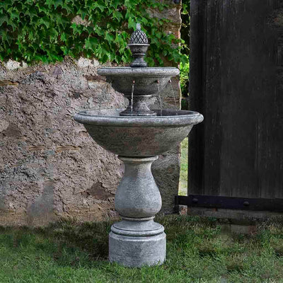 Campania International Charente Fountain, adding interest to the garden with the sound of water. This fountain is shown in the Alpine Stone Patina.