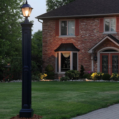 The Mayne Liberty Lamp Post with no mount, in the black finish, installed for curb appeal.