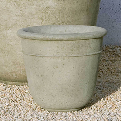 Campania International Carema Small Planter is shown in the Verde Patina. Made from cast stone.