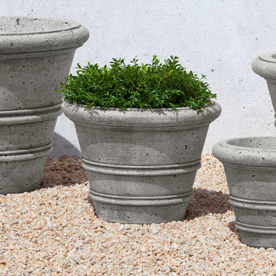 Campania International Rustic Rolled Rim 14.75 inch is shown in the Alpine Stone Patina. Made from cast stone.