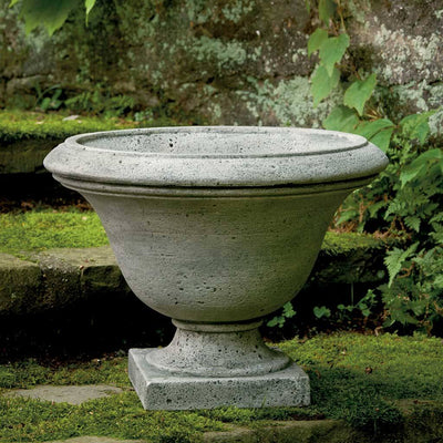 Campania International Moreland Urn is shown in the Alpine Stone Patina. Made from cast stone.