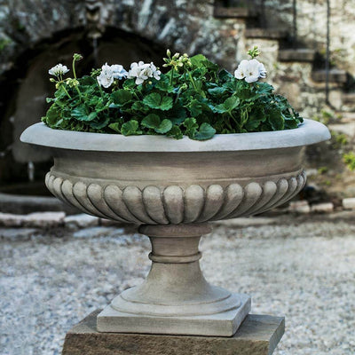 Campania International Kingscote Urn is shown in the Greystone Patina. Made from cast stone.