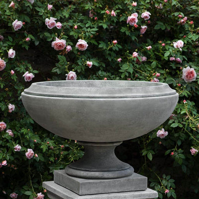 Campania International Jensen Large Urn is shown in the Alpine Stone Patina. Made from cast stone.