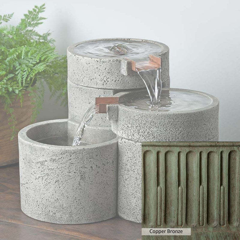 Campania International Copper Bronze Patina. Detail of the color stain Copper Bronze by Campania International. The appearance of aged copper, a rich blue green overlay of warm oranges, yellows and reds all hand-applied by Campania International artists.