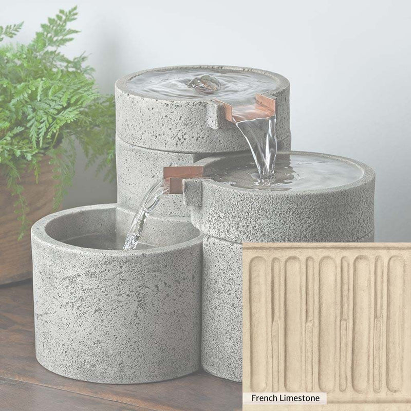 Campania International French Limestone Patina. A detail of the color stain French Limestone by Campania International. The creamy white of an old-world sculpture was hand-applied by Campania International artists.