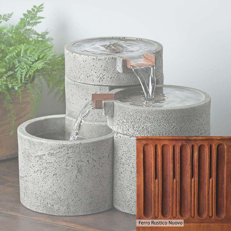 Campania International Ferro Rustico Nuovo Patina.  Detail of the color stain Ferro Rustico Nuovo by Campania International. Dramatic orange and reds with a light overlay of yellow give the appearance of aged iron, all hand-applied by Campania International artists.
