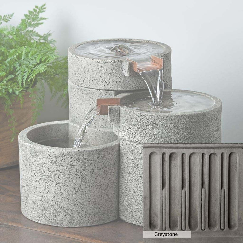 Greystone Patina for the Campania is a classic gray, soft, and muted color that blends nicely in the garden.