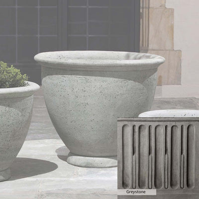 Greystone Patina for the Campania International Large Berkeley Planter , a classic gray, soft, and muted, blends nicely in the garden.