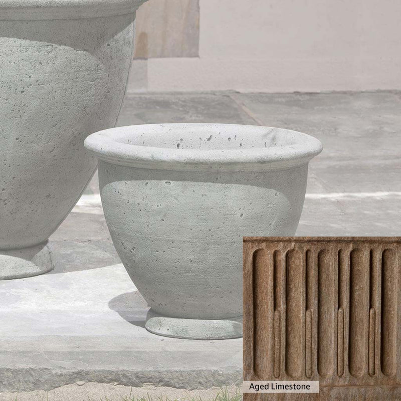 Aged Limestone Patina for the Campania International Berkeley Small Planter, brown, orange, and green for an old stone look.