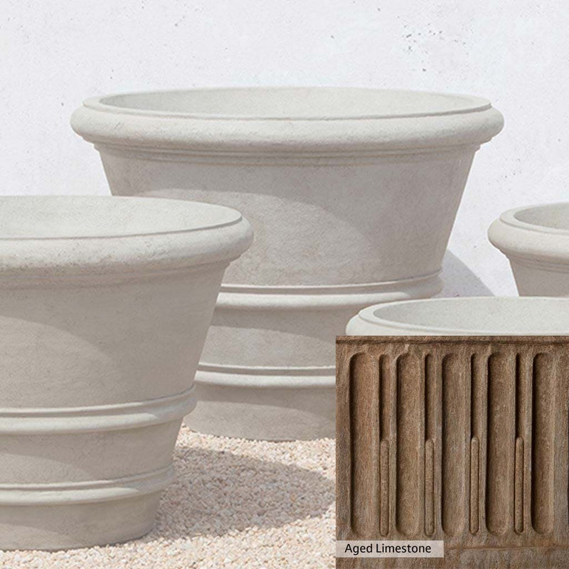 Aged Limestone Patina for the Campania International Classic Rolled Rim 35.5 inch Planter, brown, orange, and green for an old stone look.