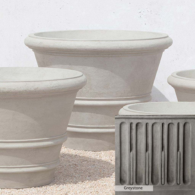 Greystone Patina for the Campania International Classic Rolled Rim 35.5 inch Planter , a classic gray, soft, and muted, blends nicely in the garden.