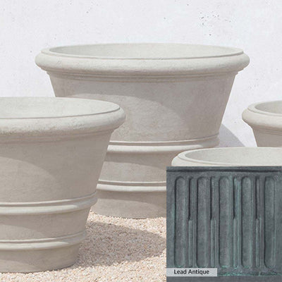 The Lead Antique Patina for the Campania International Classic Rolled Rim 35.5 inch Planter, aged blue and grey layered to give the look of a classic antique lead patina.