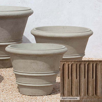 Aged Limestone Patina for the Campania International Classic Rolled Rim 27-inch Planter, brown, orange, and green for an old stone look.