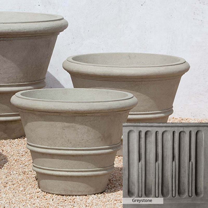 Greystone Patina for the Campania International Classic Rolled Rim 27-inch Planter , a classic gray, soft, and muted, blends nicely in the garden.