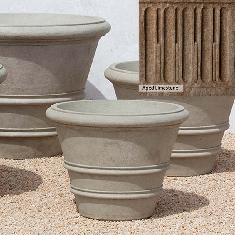 Aged Limestone Patina for the Campania International Classic Rolled Rim 24-inch Planter, brown, orange, and green for an old stone look.
