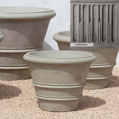 Greystone Patina for the Campania International Classic Rolled Rim 24-inch Planter , a classic gray, soft, and muted, blends nicely in the garden.