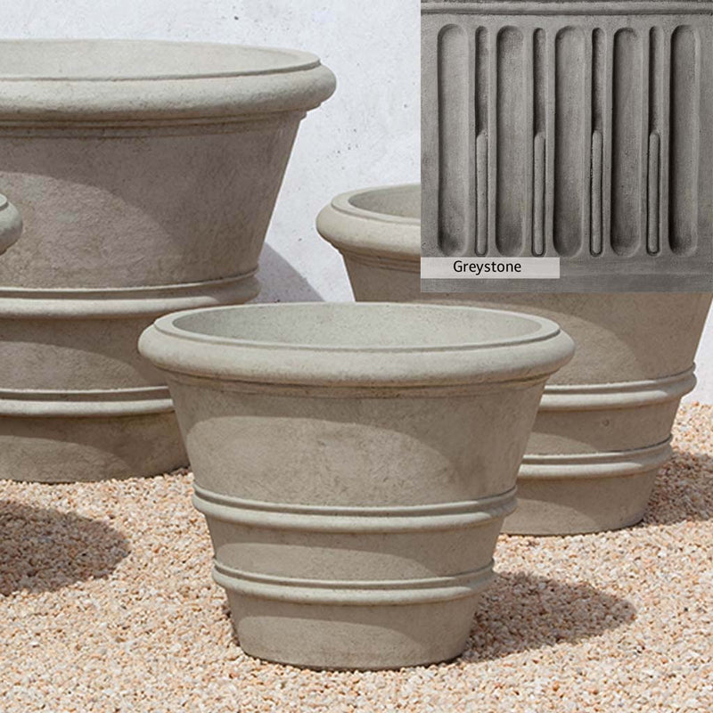 Greystone Patina for the Campania International Classic Rolled Rim 24-inch Planter , a classic gray, soft, and muted, blends nicely in the garden.