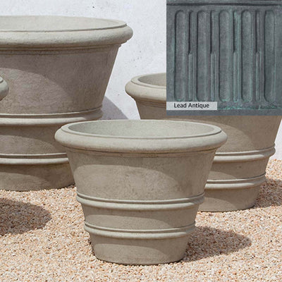 The Lead Antique Patina for the Campania International Classic Rolled Rim 24-inch Planter, aged blue and grey layered to give the look of a classic antique lead patina.