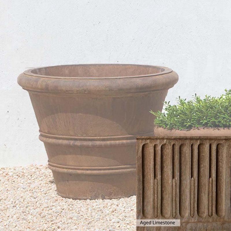 Aged Limestone Patina for the Campania International Classic Rolled Rim 20.75-inch Planter, brown, orange, and green for an old stone look.
