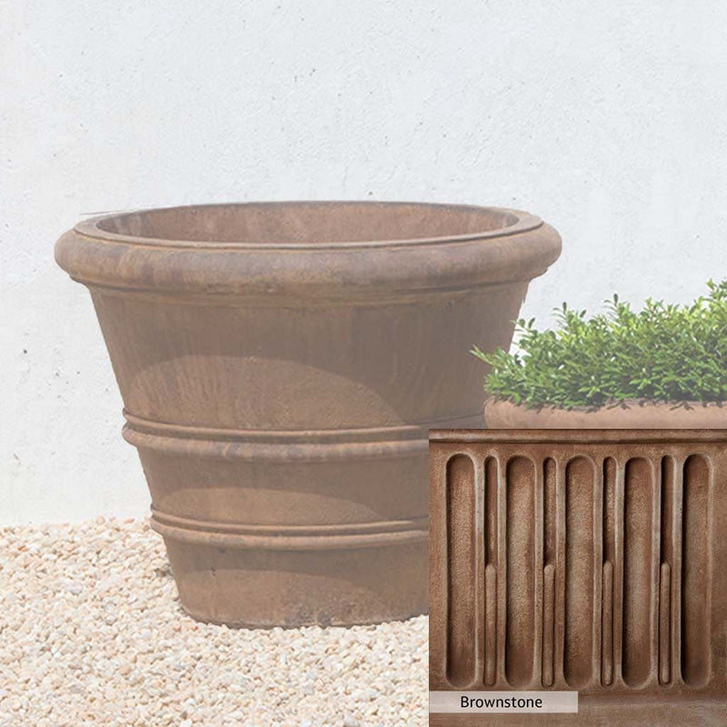 Brownstone Patina for the Campania International Classic Rolled Rim 20.75-inch Planter, brown blended with hints of red and yellow, works well in the garden.