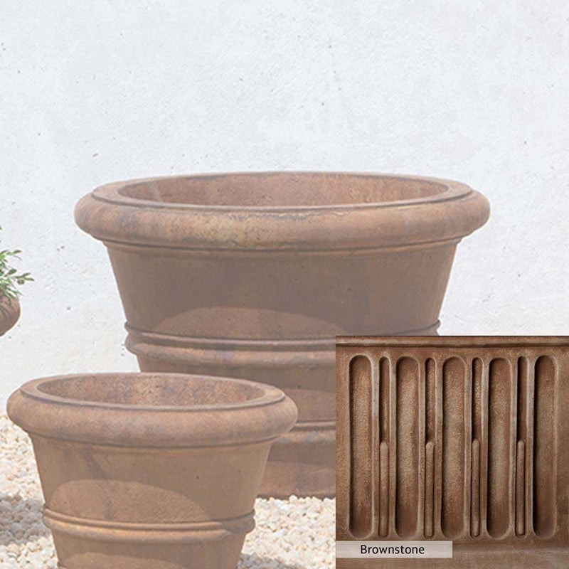 Brownstone Patina for the Campania International Classic Rolled Rim 18.25-inch Planter, brown blended with hints of red and yellow, works well in the garden.