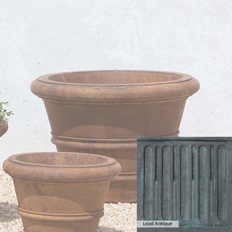 The Lead Antique Patina for the Campania International Classic Rolled Rim 18.25-inch Planter, aged blue and grey layered to give the look of a classic antique lead patina.