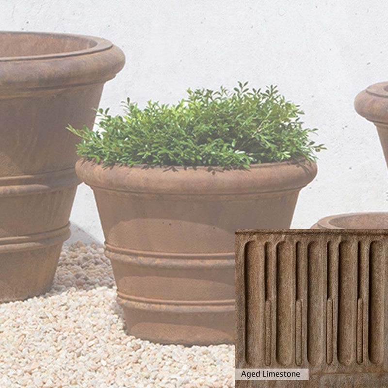 Aged Limestone Patina for the Campania International Classic Rolled Rim 14.75-inch Planter, brown, orange, and green for an old stone look.