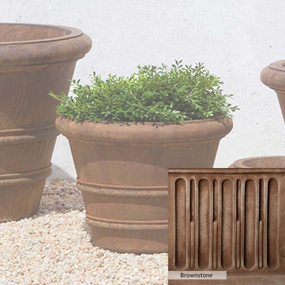 Brownstone Patina for the Campania International Classic Rolled Rim 14.75-inch Planter, brown blended with hints of red and yellow, works well in the garden.