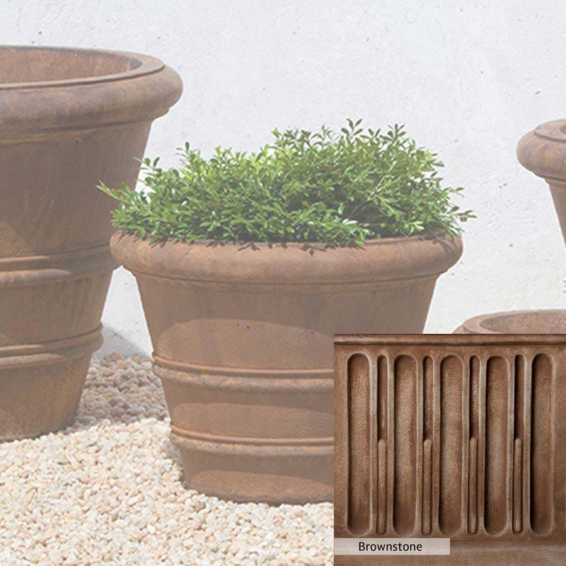 Brownstone Patina for the Campania International Classic Rolled Rim 14.75-inch Planter, brown blended with hints of red and yellow, works well in the garden.