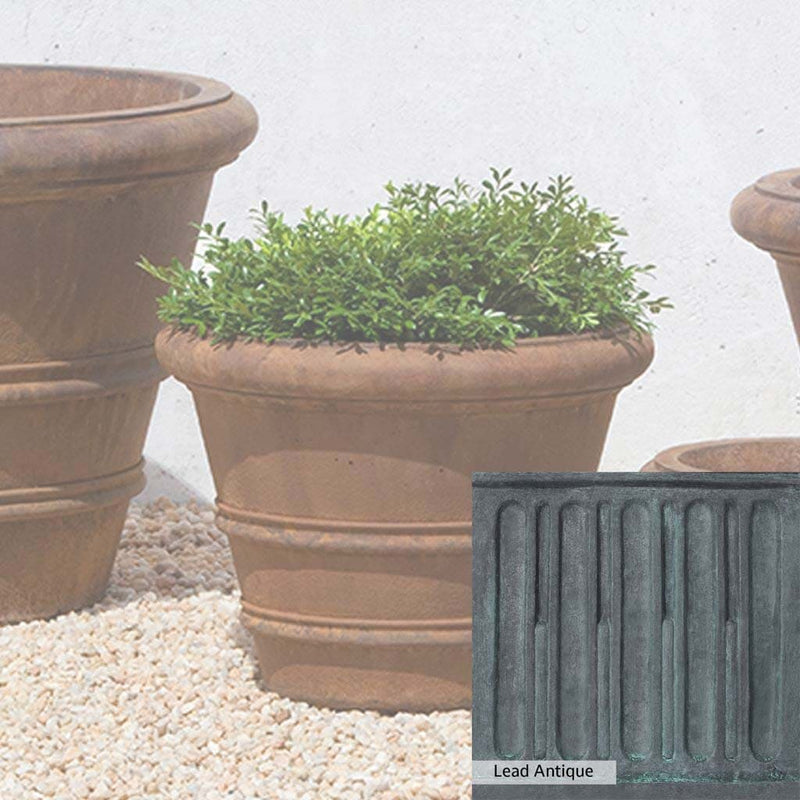 The Lead Antique Patina for the Campania International Classic Rolled Rim 14.75-inch Planter, aged blue and grey layered to give the look of a classic antique lead patina.
