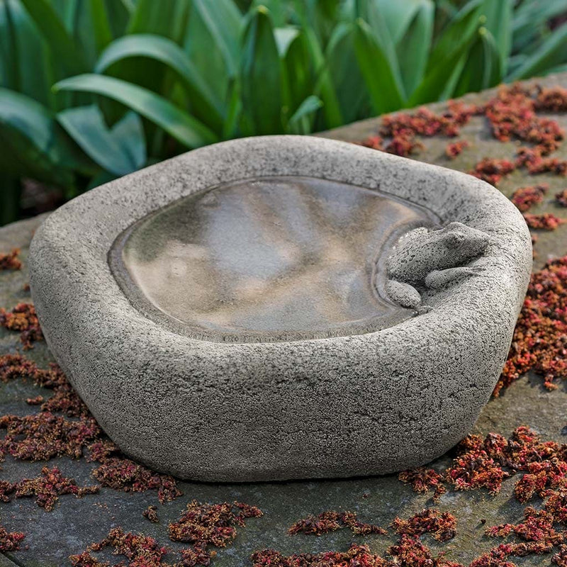 Campania International Woodland Birdbath, displayed in Greystone, a classic garden gray and a best-selling color.