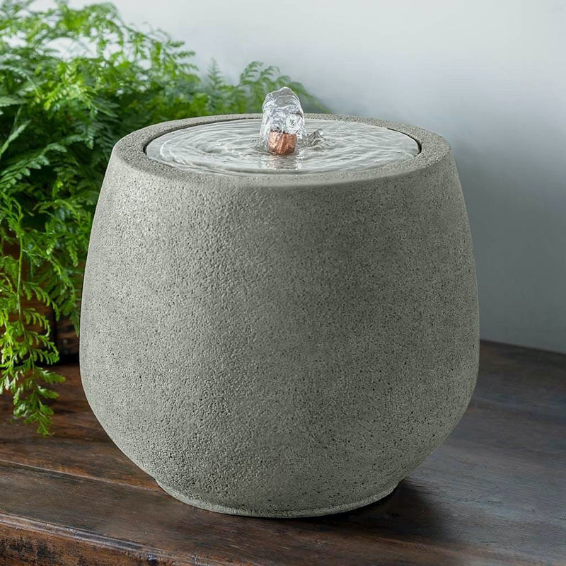 Campania International Alvar Fountain  is stained in the Alpine Stone patina, showing off the details of the fountain.