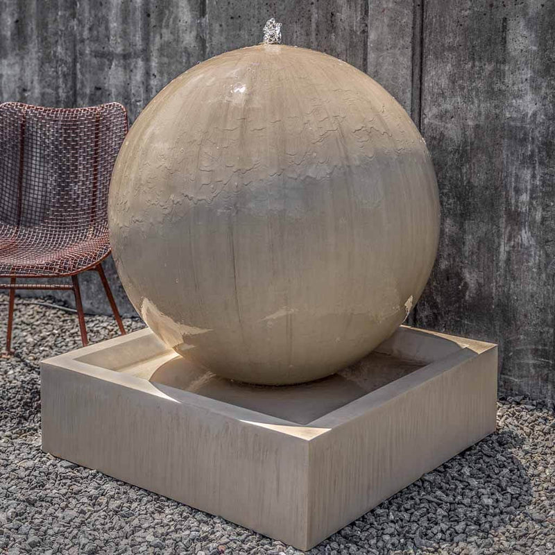 Campania International Large Sphere Fountain is stained in the French Limestone color, a creamy white with ivory undertones.