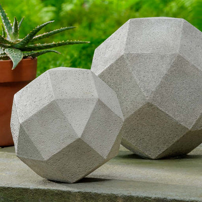 Campania International Polyhedron Small Statue stained in the Greystone patina, the ideal color for this garden statue.