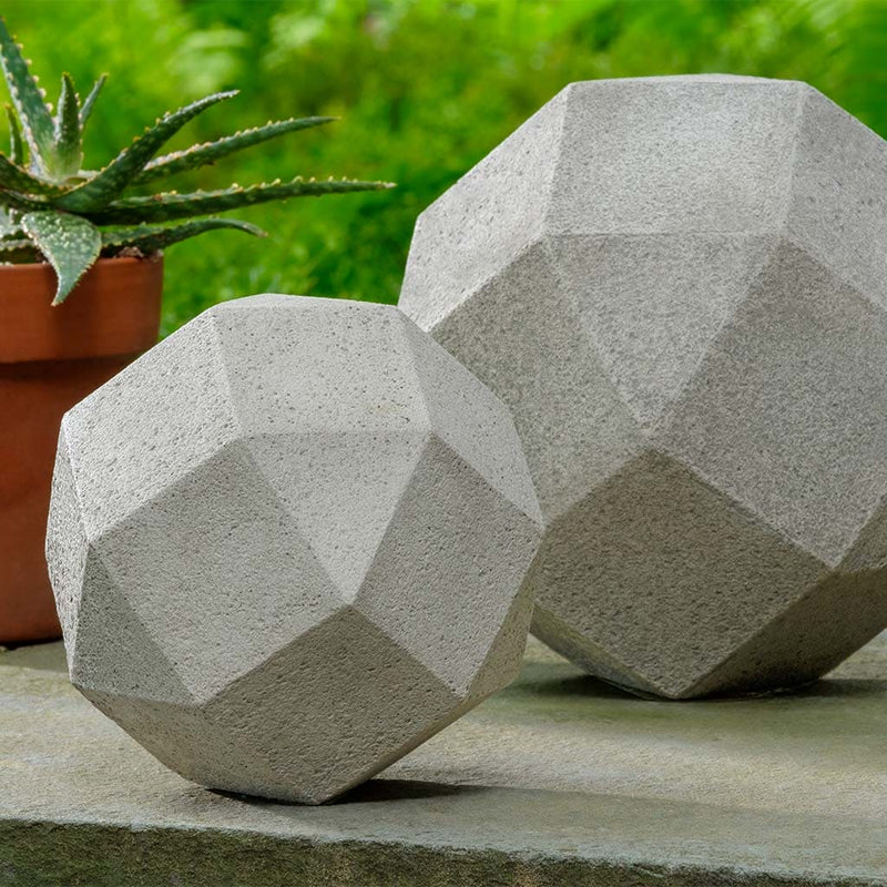 Campania International Polyhedron Small Statue stained in the Greystone patina, the ideal color for this garden statue.