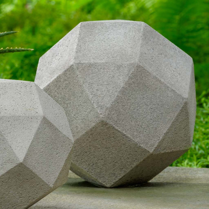 Campania International Polyhedron Medium Statue stained in the Greystone patina, the ideal color for this garden statue.