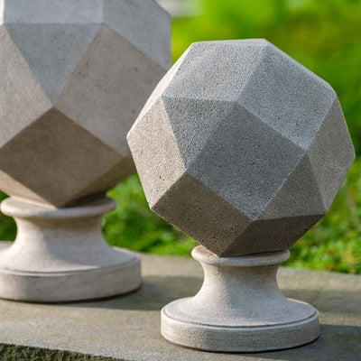 Campania International Polyhedron Finial stained in the Greystone patina, the ideal color for this garden statue.