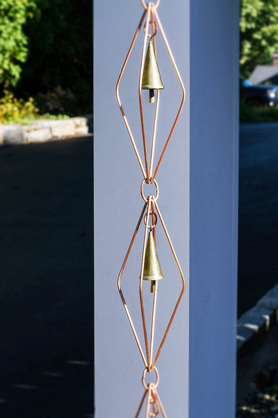 Good Directions Diamond Pure Copper 8.5 ft. Rain Chain with Bells beautifully reflective in the sunlight.