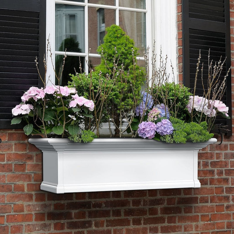 The Mayne Yorkshire 3ft Window Box, in the white finish, planted and mounted on home for curb appeal