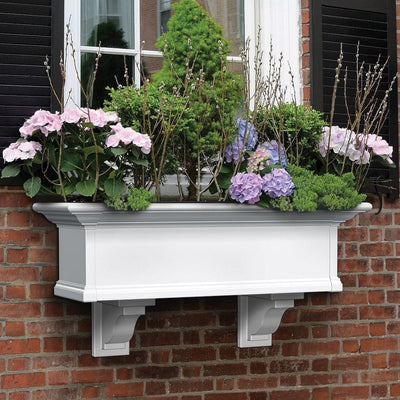 The Mayne Yorkshire 3ft Window Box, in the white finish, planted and mounted on home for curb appeal