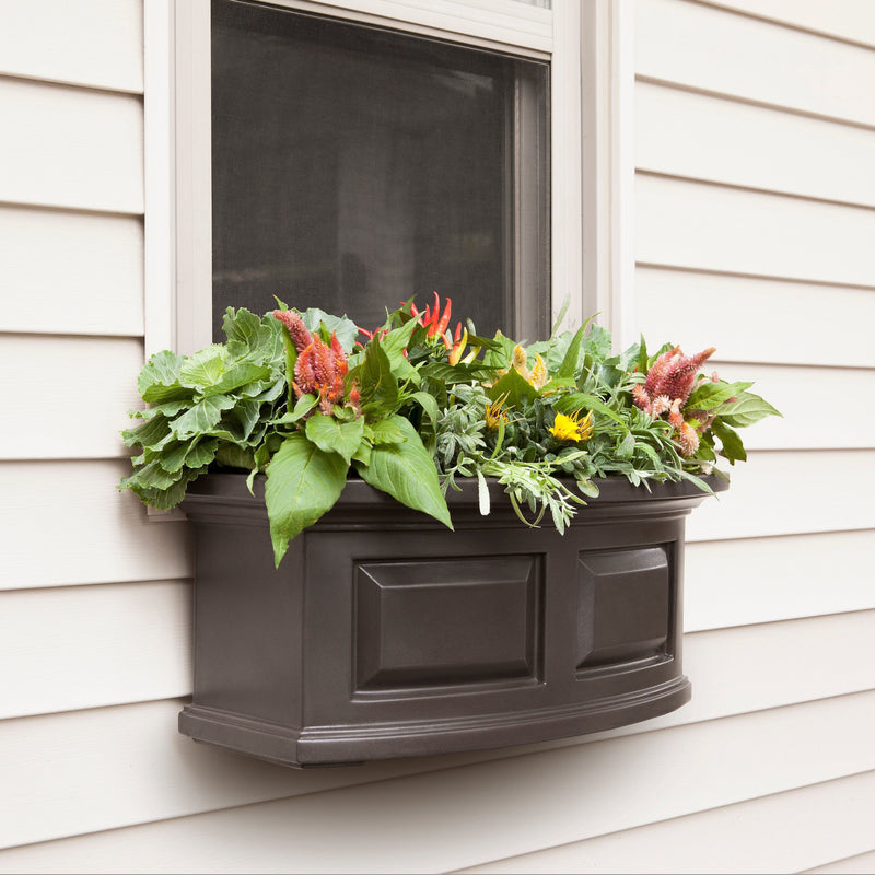 The Mayne Nantucket 2ft Window Box Planter, in the espresso finish, planted and mounted on home for curb appeal
