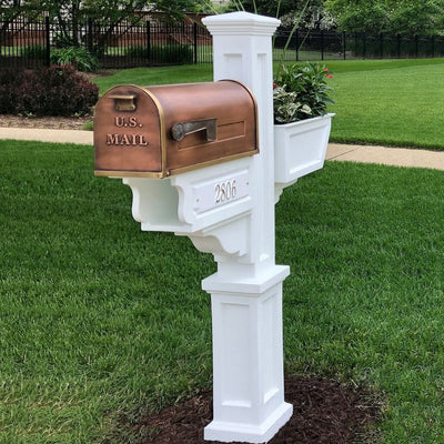 The Mayne Signature Plus Mail Post, in the white finish, installed for curb appeal.