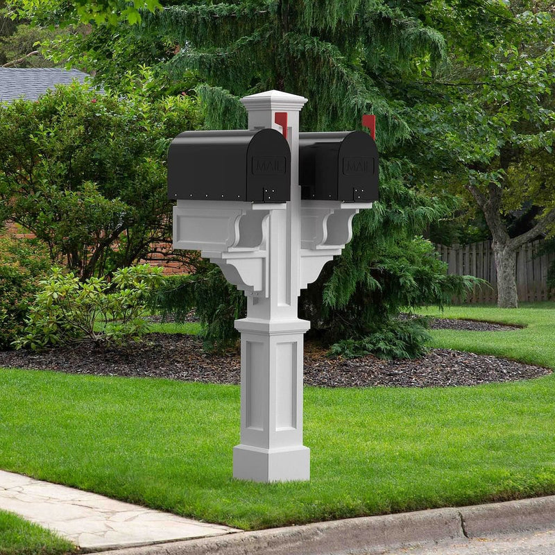 The Mayne Rockport Double Mail Post, in the white finish, installed for curb appeal.
