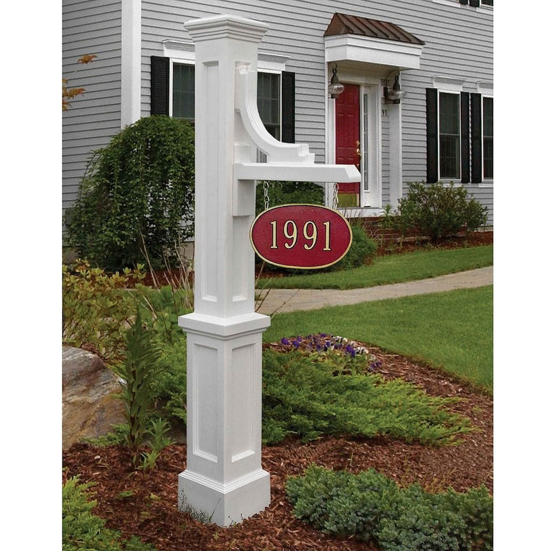 The Mayne Woodhaven Address Sign Post, in the white finish, installed for curb appeal.