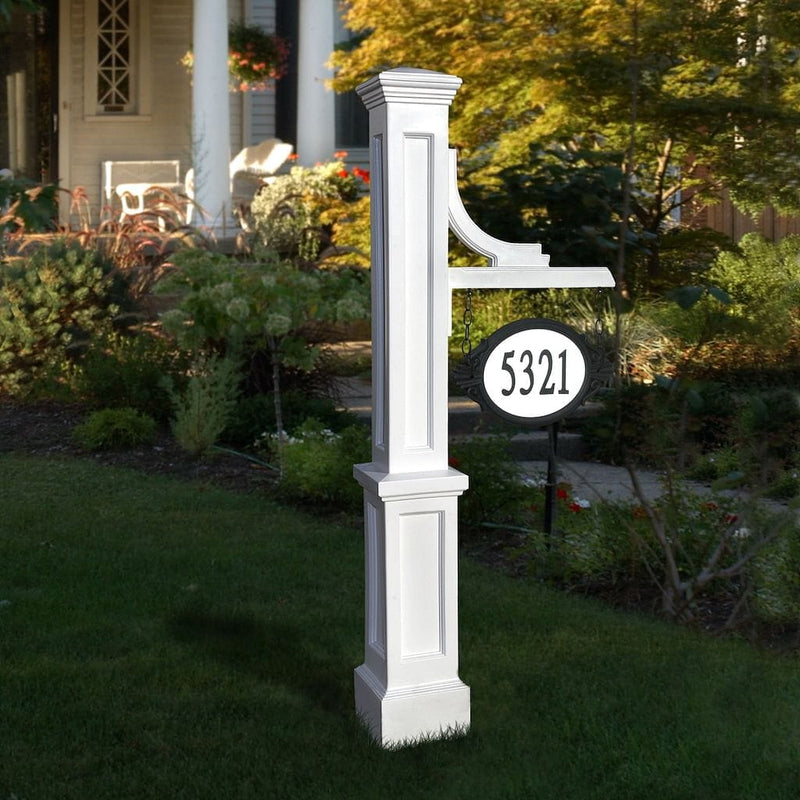 The Mayne Woodhaven Address Sign Post, in the white finish, installed for curb appeal.