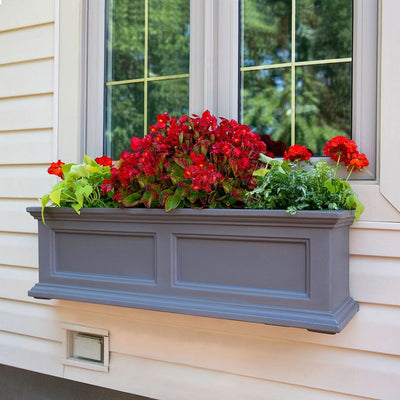 The Mayne Fairfield 3ft Window Box Planter, in the graphite finish,planted and mounted on home for curb appeal